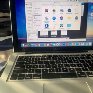 Mac book bro with case.